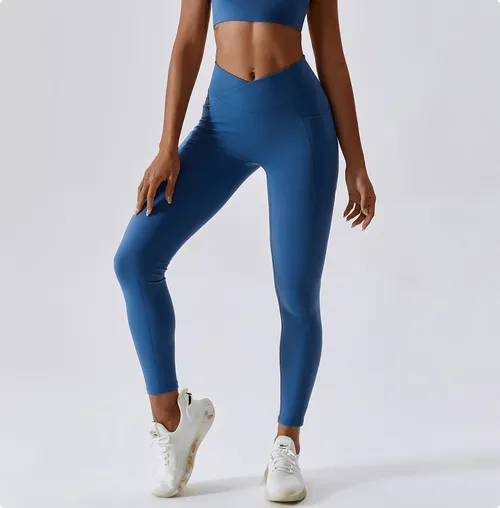 Női gyorsan száradó sport leggings magas derékszíjjal és zsebekkel az oldalán