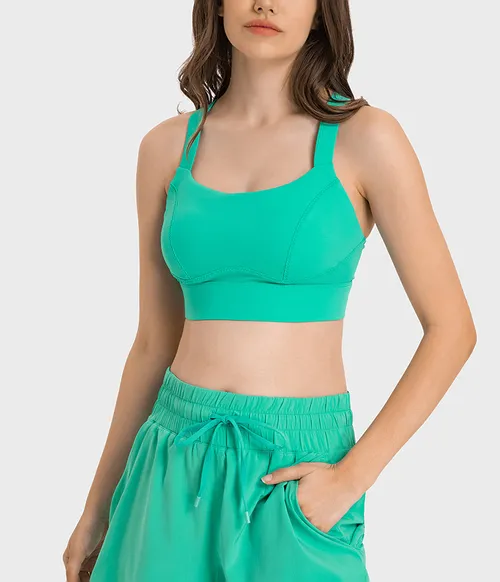 Soutien-gorge de sport à haute élasticité et anti-choc pour femmes avec fermeture à trois rangées et design de soutien latéral