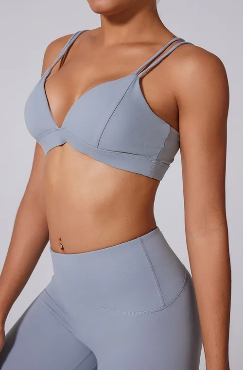 Soutien-gorge de sport pour femmes, de couleur unie, avec double bretelle et effet push-up