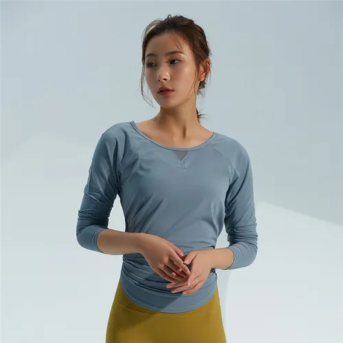 Chemise de sport pour femmes avec manches longues, fente dans le dos et détails en maille