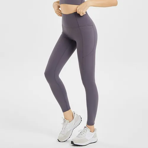 Leggings de sport à taille haute pour femmes avec coutures et poches contrastées