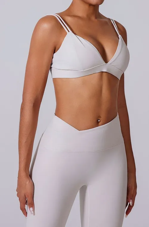 Soutien-gorge de sport pour femmes, de couleur unie, avec double bretelle et effet push-up