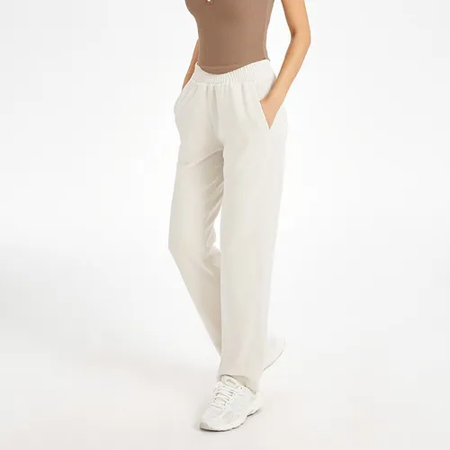 Pantalon de sport ample pour femmes avec taille élastique et poches