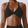 Dámská fitness podprsenka s překřížením a originálně řešenou zadní částí