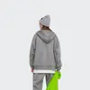 Unisex volná stylová jednobarevná mikina na zip s kapsami a kapucí 