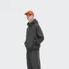 Unisex volná stylová jednobarevná mikina na zip s kapsami a kapucí 